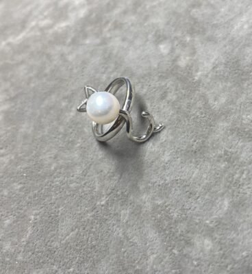 cat with a pearl